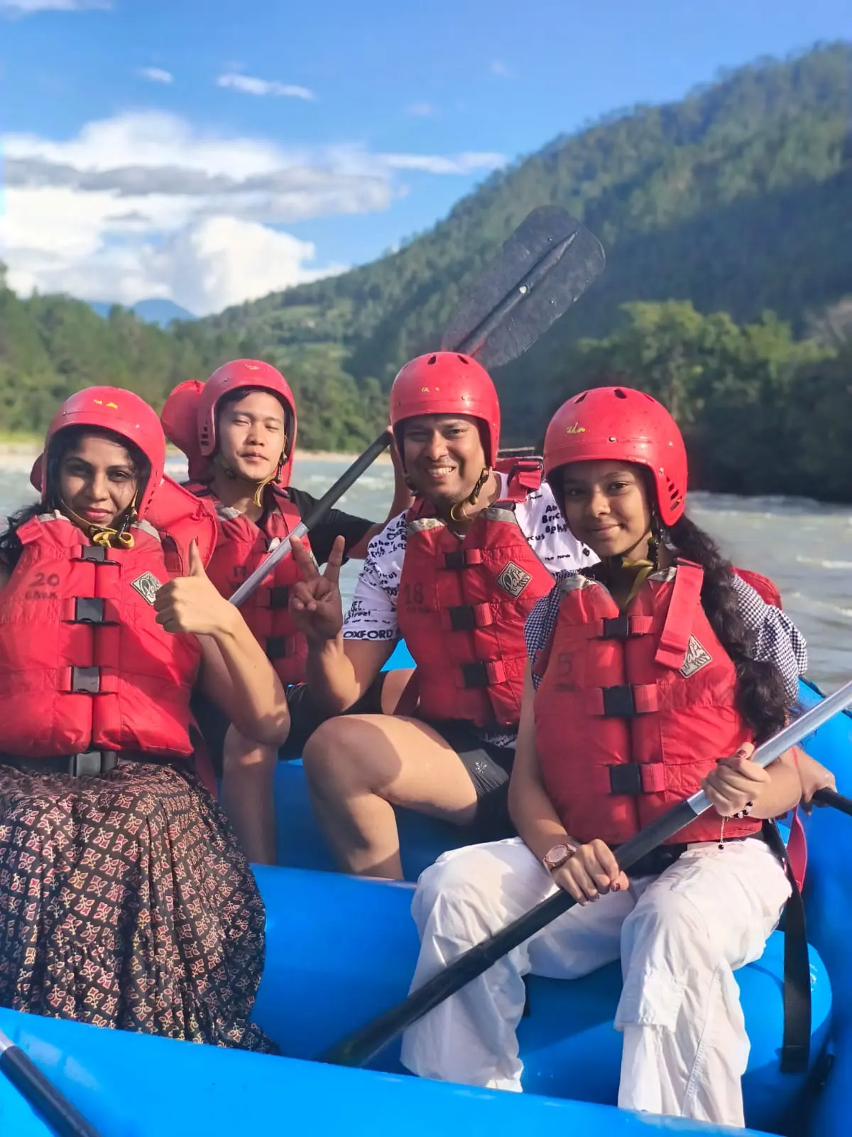 Tourists whitewater rafting on Mo Chhu